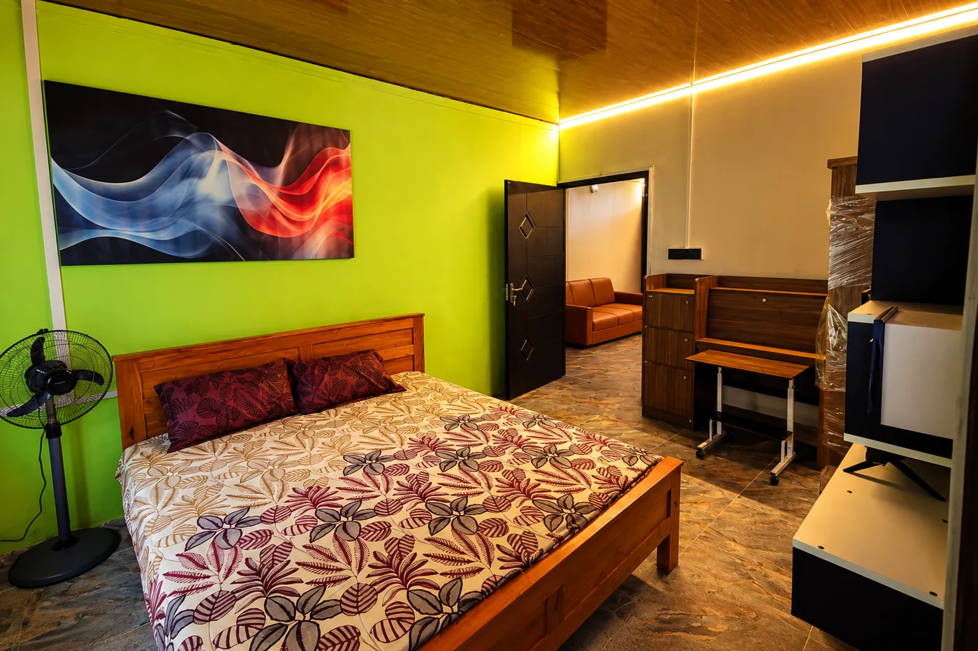 Wood-accented bedroom suite at HYGEIA